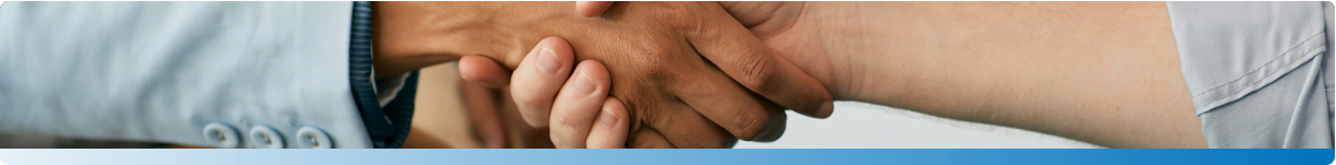 Two people shaking hands.